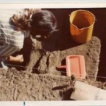 Photographs of landscape of Bolinas Bay. Unidentified archaelolgist working, close up of trench