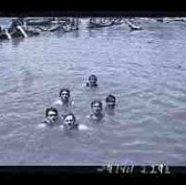 Young men swimming