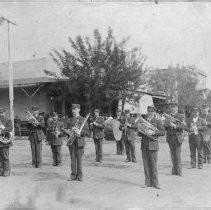 Unidentified band standing in a street