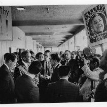 Eugene McCarthy, speaking with a large group of reporters after a press conference