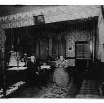 Mr. and Mrs. William Siebert at home above present Post Office, Columbia, Calif., about 1900