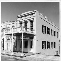 The old Pioneer Telegraph Building has been remodeled and now is home to Dohrmann Co. In background, the old Apex Rooms signage is still visible