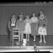 Unidentified group of teen aged children wearing costume leis