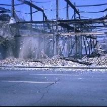 Views of redevelopment sites showing the demolition of buildings and reconstruction in the district. These views date from 1959 to 1964. This view shows the pre-demolition of 3rd and J Streets in preparation for the I-5 Freeway