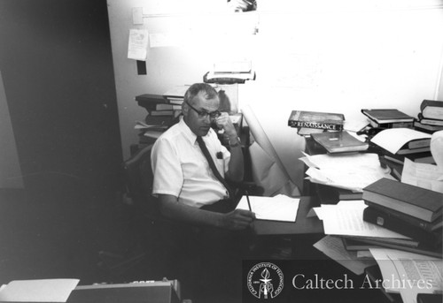 Clair Patterson at his desk