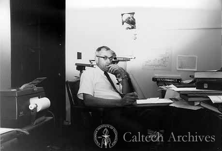 Clair Patterson at his desk