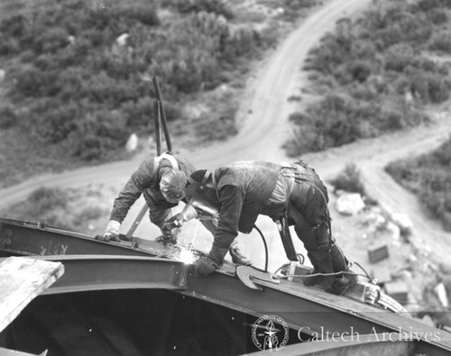 Workmen welding the dome for the 200"