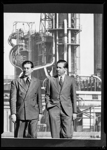 Men and oil refinery, Southern California, 1940