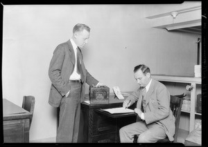 President, retail purchasing agent and Mr. Price signing contract, Southern California, 1929