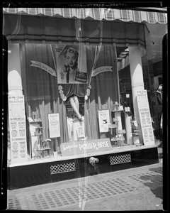 Window display and counter showing powder base, Los Angeles, CA, 1940