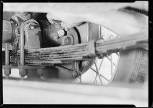 Lubricating Chevrolet parts, Southern California, 1931