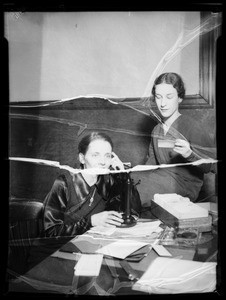 Young Democrats groups in office 206 of Angelus Hotel and Mrs. Harry G. Henly in her office, Los Angeles, CA, 1935