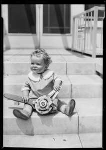 Shock absorber and baby, Southern California, 1926