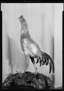 Vase and silver rooster at home of Mr. Thackleden, 2000 North Van Ness Avenue, Los Angeles, CA, 1931