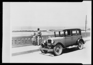 Logan Stebbins in Chevrolet on bridge at Del Mar, CA, 1927