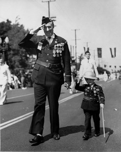 American Legion parade, Long Beach, saluting decorated American legion "veterans", young and old