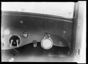 Mrs. Brye with auto hand mirror and light, Southern California, 1928