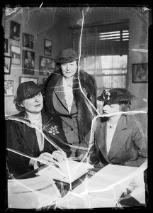 Mrs. Walter P. Story, etc., signing papers, Los Angeles, CA, 1936