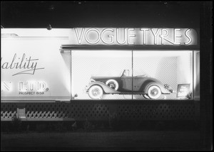 Vogue Tyre board with Buick roadster, Southern California, 1935