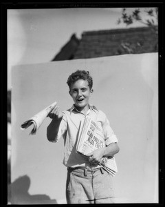 Edward as newsboy, Southern California, 1935