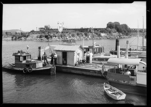 Pleasure boats with Union Oil station, Nanaimo, British Columbia, Canada, 1935