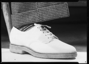 White sport shoe and trouser leg, Southern California, 1935