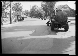 Crescent Oil Company truck and scene of accident between 9th and 10th on Hoover Street, Southern California, 1935