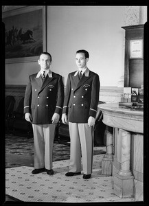 Bell boys at Westminster Hotel wearing new uniforms, South Main Street & West 4th Street, Los Angeles, CA, 1940