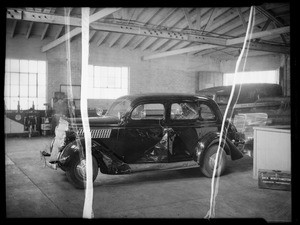 Wrecked Ford sedan, L.W. Zimmerman owner and assured, Southern California, 1935