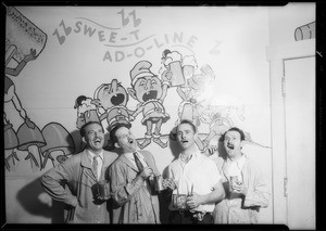 Artists decorating walls of beer room, Southern California, 1933