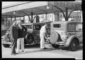 Elks caravan information cars at Shell station, Southern California, 1931