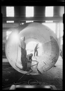 Welding steel pipe, Western Pipe and Steel, Southern California, 1933