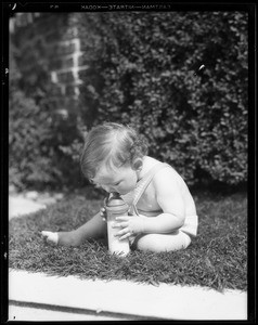 Baby & bottle of milk, Southern California, 1932