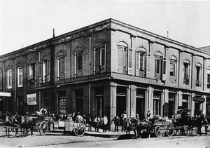 Wells Fargo & Company's Express, hat store, horse & buggy, dirt roads, cigar shop