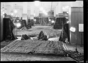 Display of oriental rugs in rug department, Southern California, 1932