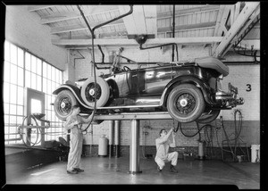 Greasing rack at Hollywood branch, Los Angeles, CA, 1930