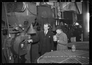 Manager of Ben Hur plant in coffee roasting department with Anna Belle Lee, Mrs. Marion Herbert, and Agnes White, Los Angeles, CA, 1935