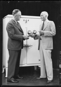 Girls and small boxes, Wilson, Watson, and clock, Southern California, 1932