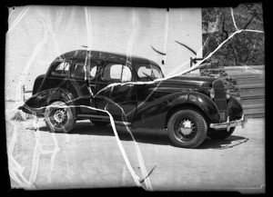 Wrecked 1935 Oldsmobile sedan, A. J. Floyd owner and assured, Los Angeles, CA, 1936