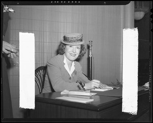 Gracie Allen autographing her books, Southern California, 1940