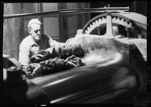 Man working on mill, Kirkhill Rubber Co., Southern California, 1934