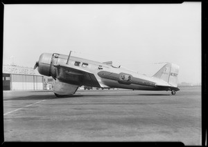 Transcontinental and Western Airlines mail plane at Glendale airport, Glendale, CA, 1931