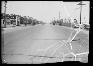 Intersection of West Pico Boulevard and Fox Hills Drive and Ford roadster at West Los Angeles Police Station, Los Angeles, CA, 1936