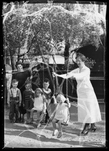 Children at day nursery with easter baskets, Southern California, 1936