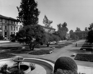 A water fountain foregrounds the landscape of Occidental College