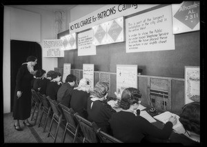 Telephone operators in window, Southern California, 1935