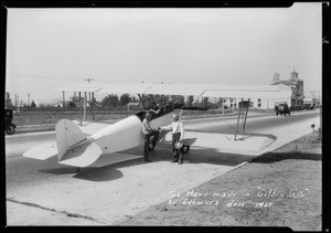 Industrial buildings in Golden Gate Park and airplane, Southern California, 1927