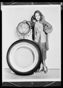 Girl with globe photo and Dayton tire, Southern California, 1931