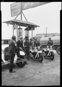 Venice police filling up with Purr-Pull gas, 11520 Washington Boulevard, Los Angeles, CA, 1930