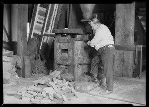 Sawdust briquets at Ferukolts Machine Company, Southern California, 1926